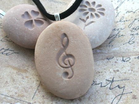 The G-clef - Tiny PebbleGlyph (C) Pendent - engraved pebble necklace for music lover Online now